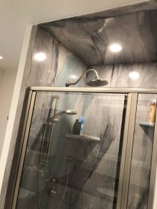 Gray Marble Shower with Silver Showerhead