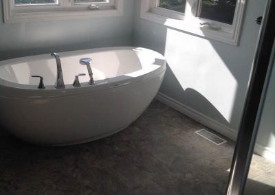 White Bathtub with Silver Accents