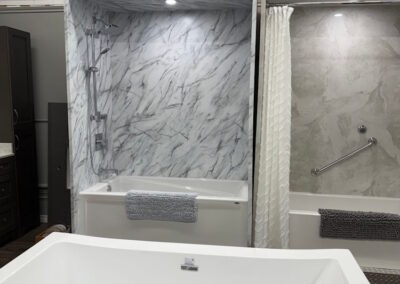 Back display in the show room of two custom bath tubs.