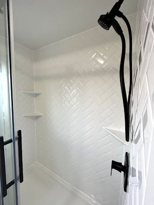 renovated bathroom shower wall